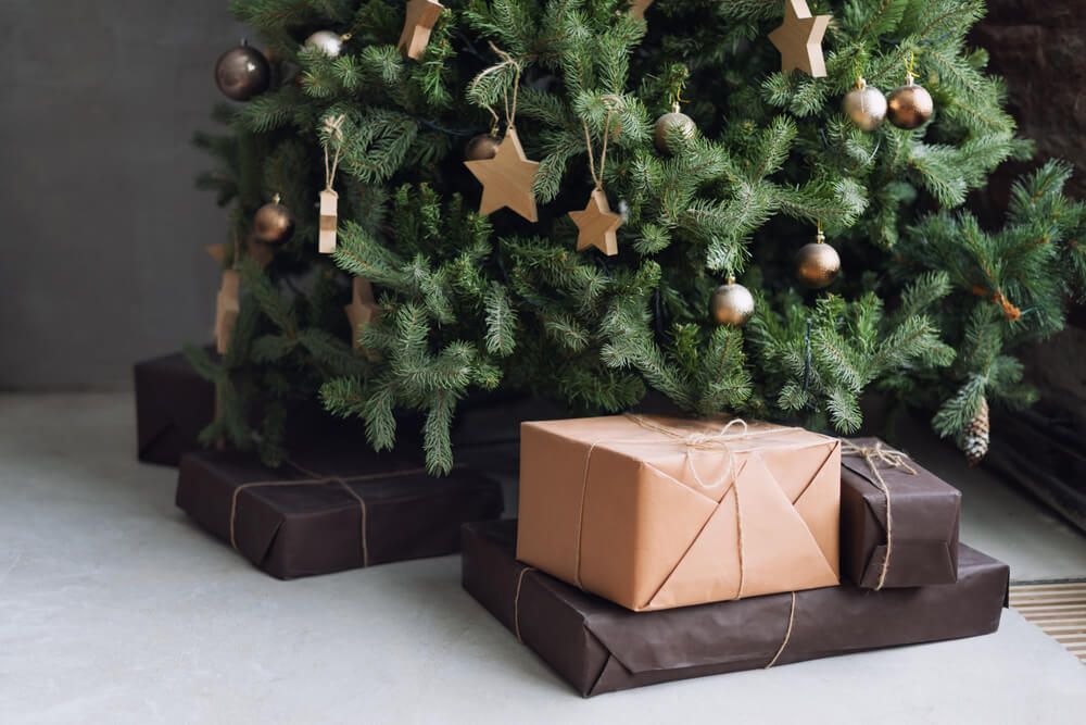 christmas tree with paper-wrapped gifts