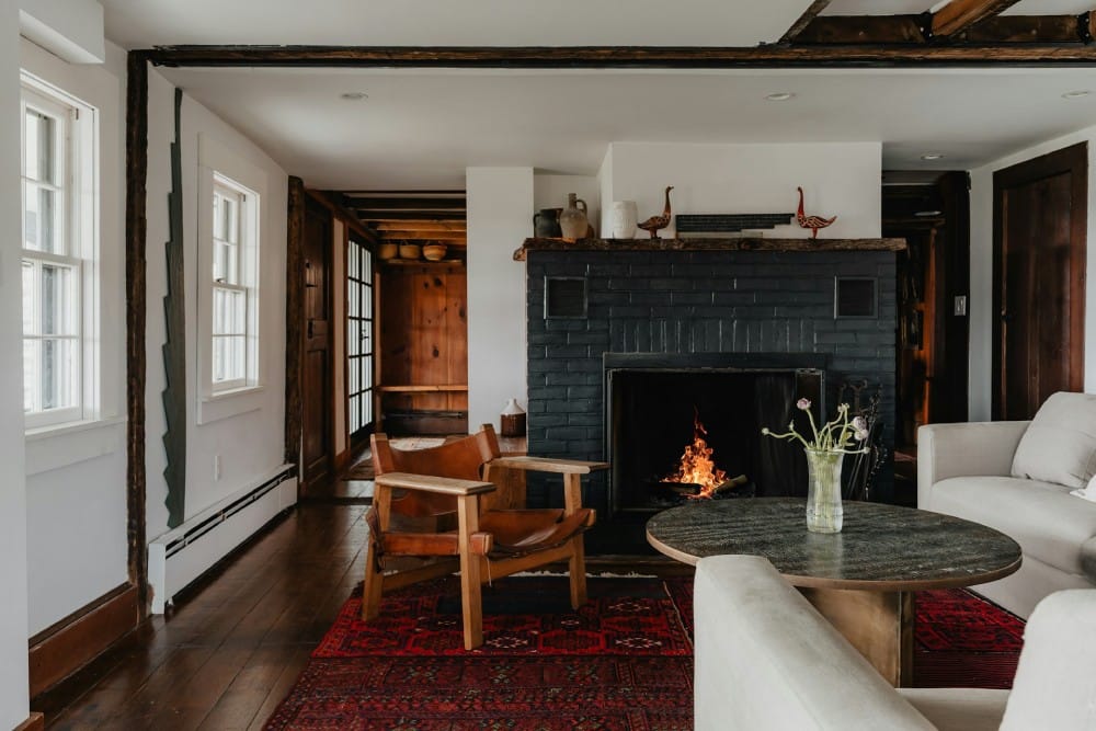 cozy living room with wooden floors and a fireplace