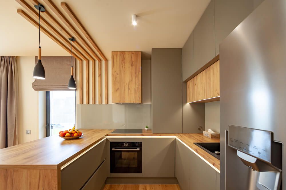 Beautiful Grey Modern Kitchen in a Luxury Apartment with Stainless Steel Appliances