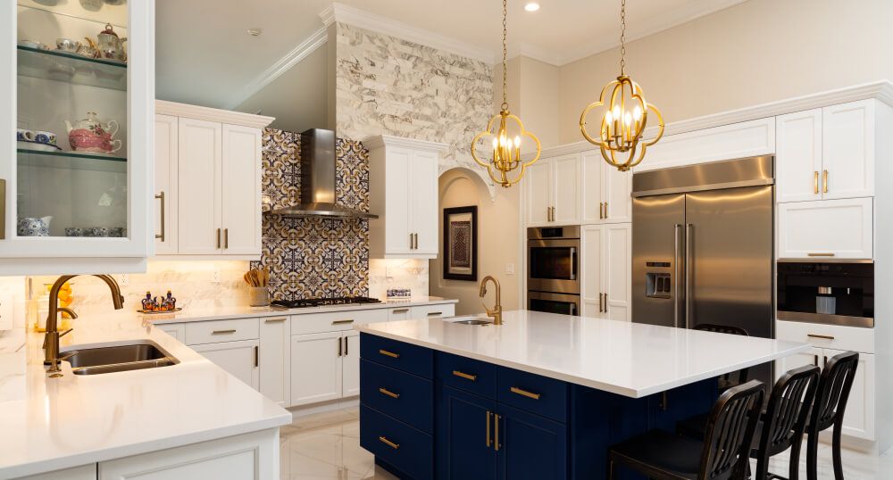 Beautiful luxury home kitchen with white cabinets.