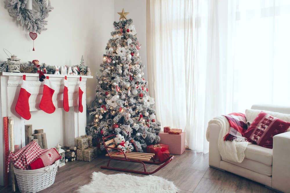 red and white stocking hanging on a fireplace