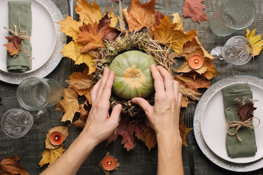 pumpking and dried leaves table centerpiece