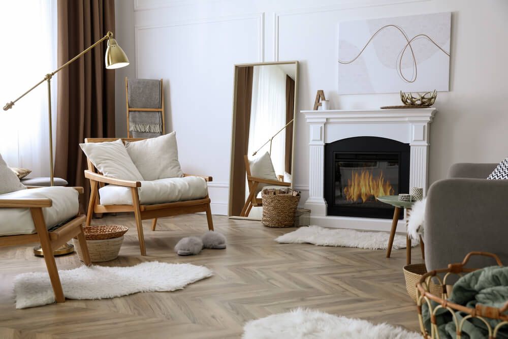 Beautiful living room interior with fireplace and armchairs